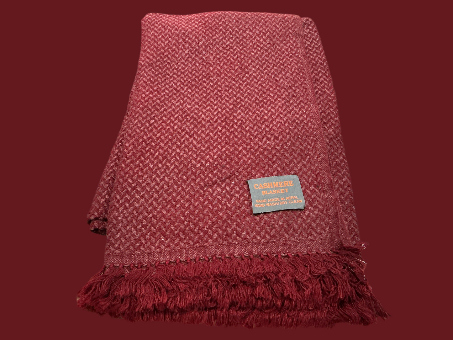 Red cashmere fringe blanket