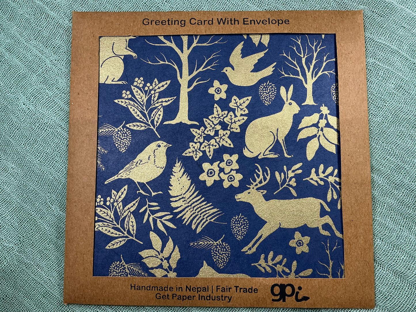 Forest gold and navy card made in Nepal