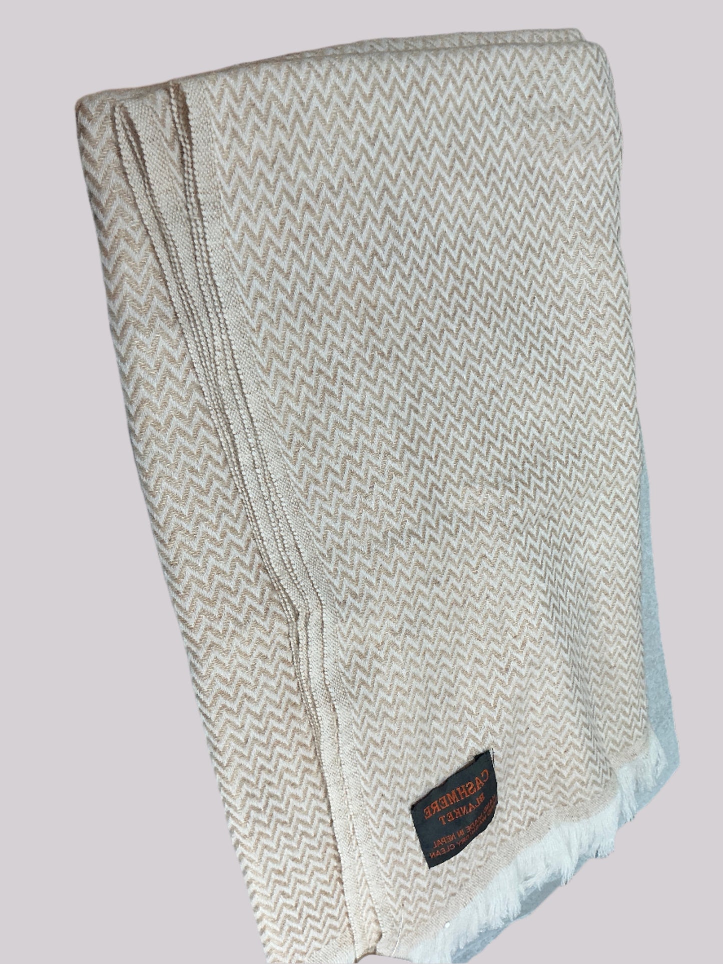 Peach cashmere fringe blanket