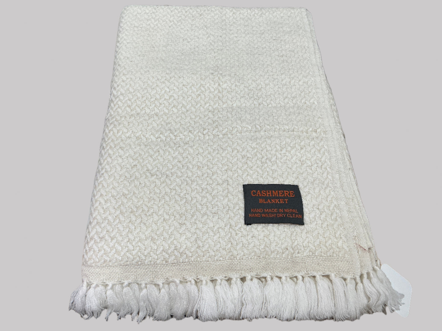 Beige cashmere fringe blanket