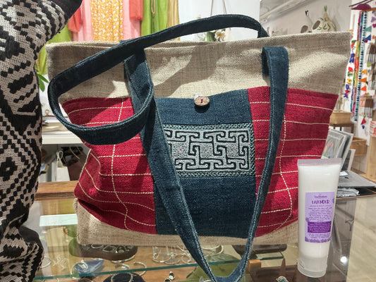 Small red woven over the shoulder bag
