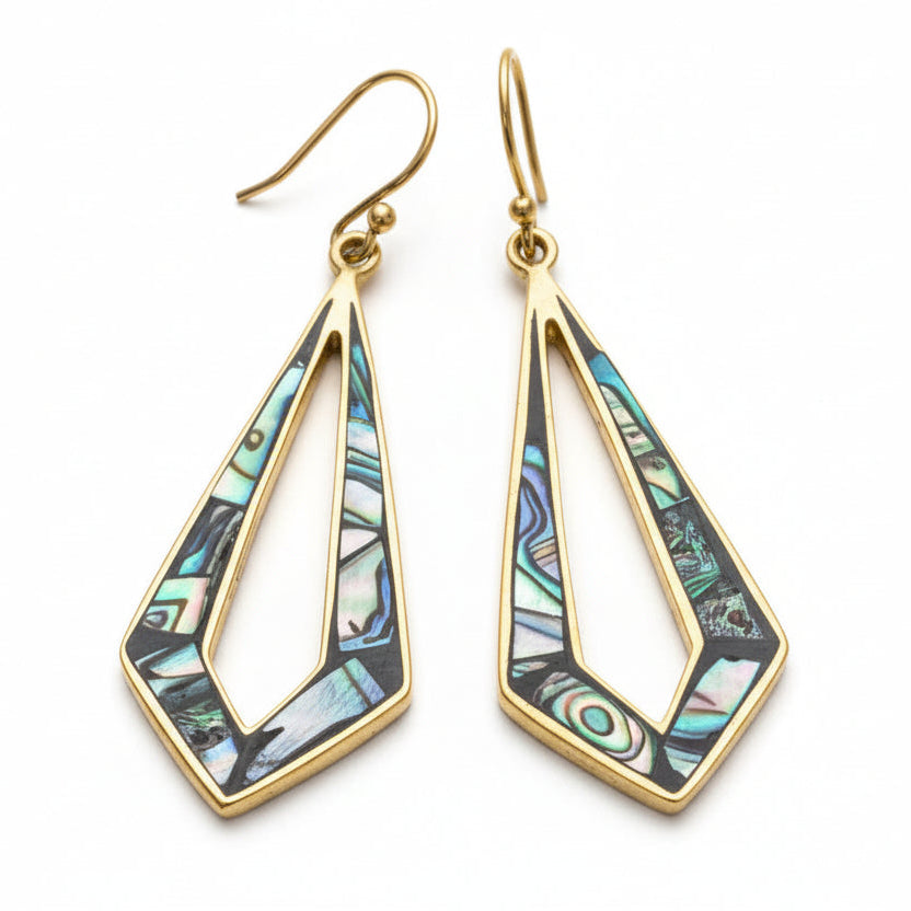 Pair of brass earrings against a pure white background.