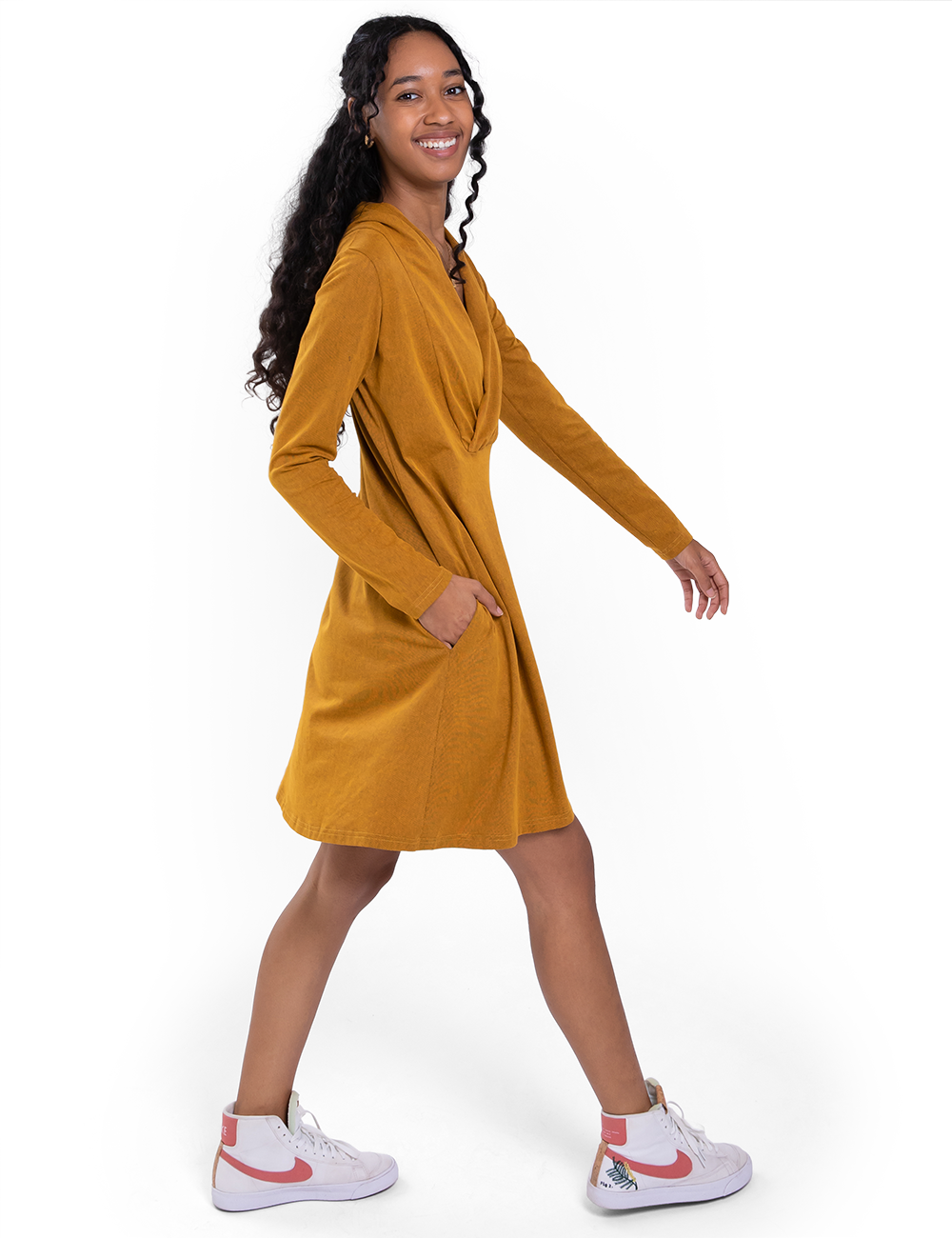Diana Dress - This long sleeve, v-neck dress features two side pockets.