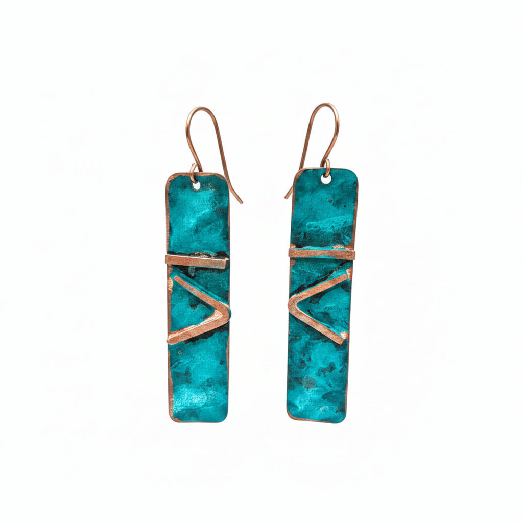 Long brass earring with turquoise paint